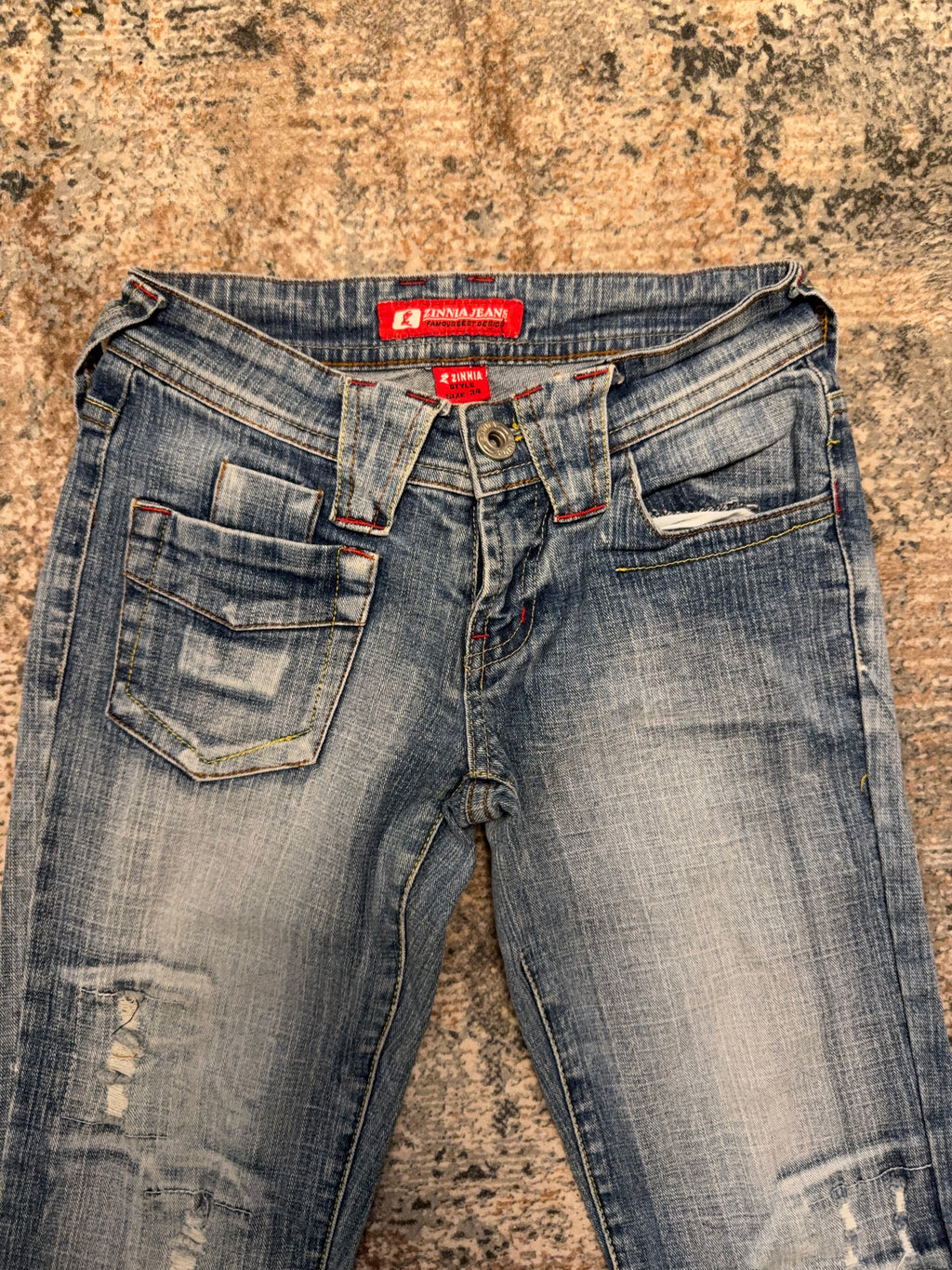 The Distressed Flare Denim