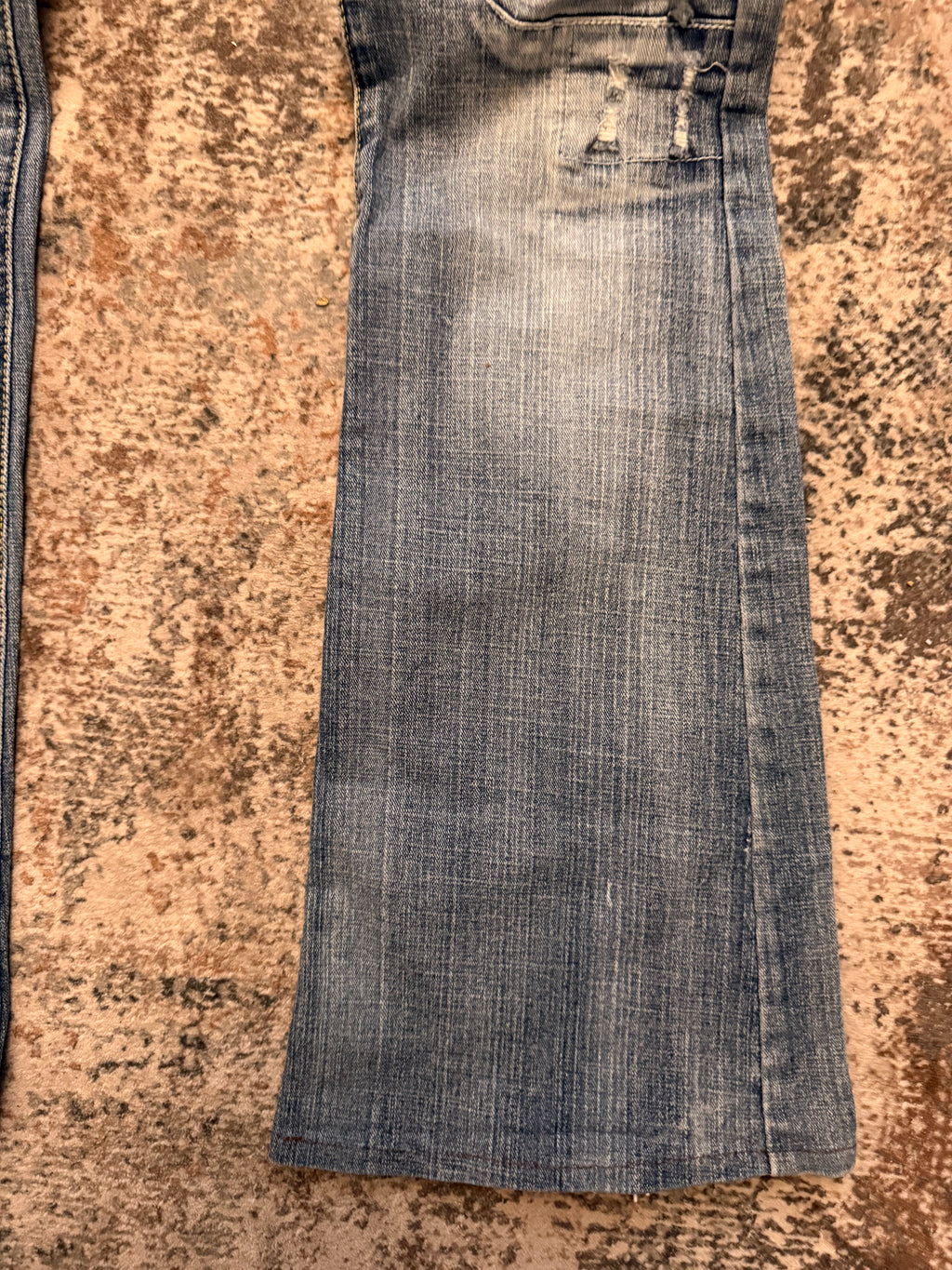 The Distressed Flare Denim