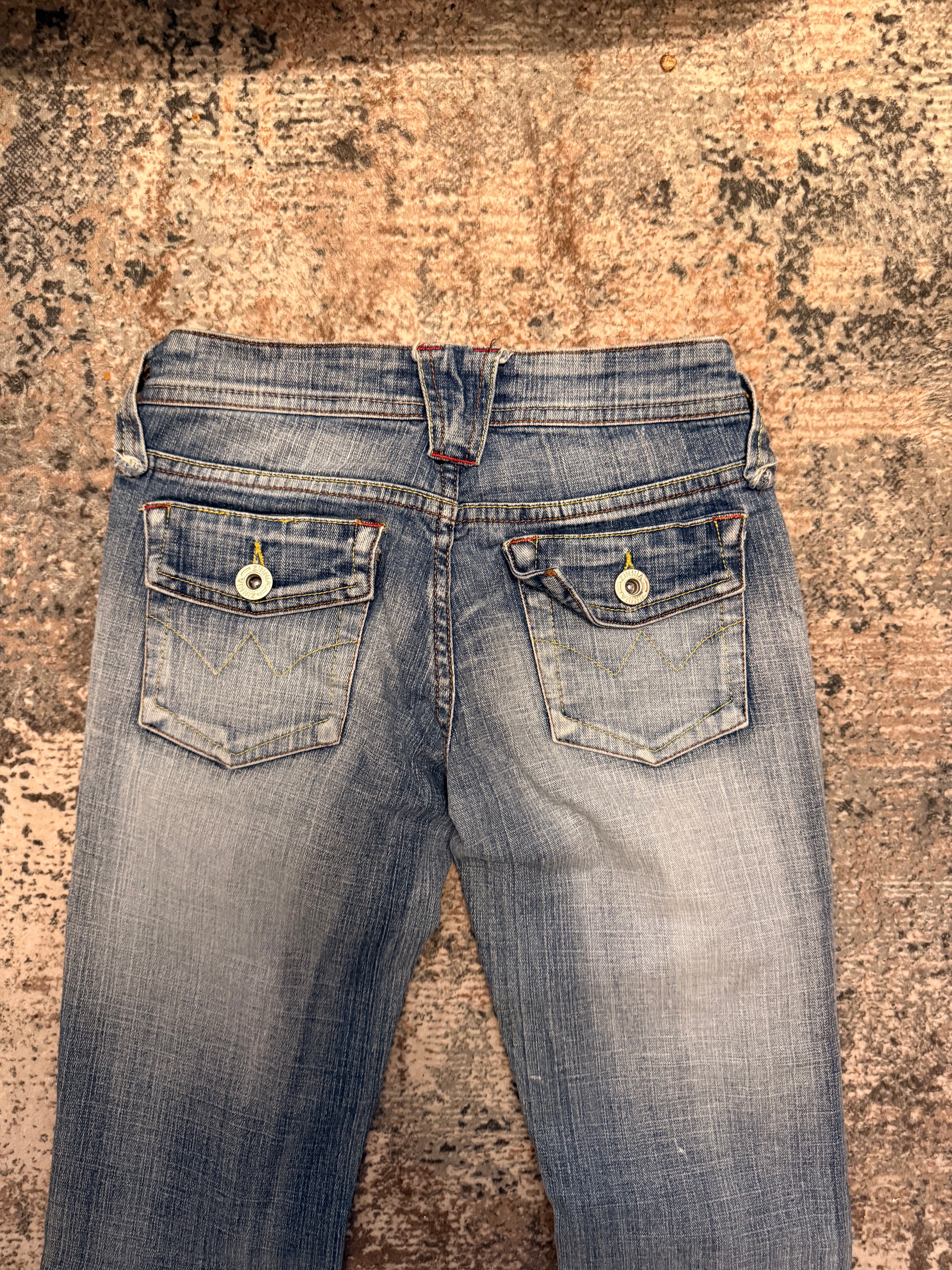 The Distressed Flare Denim