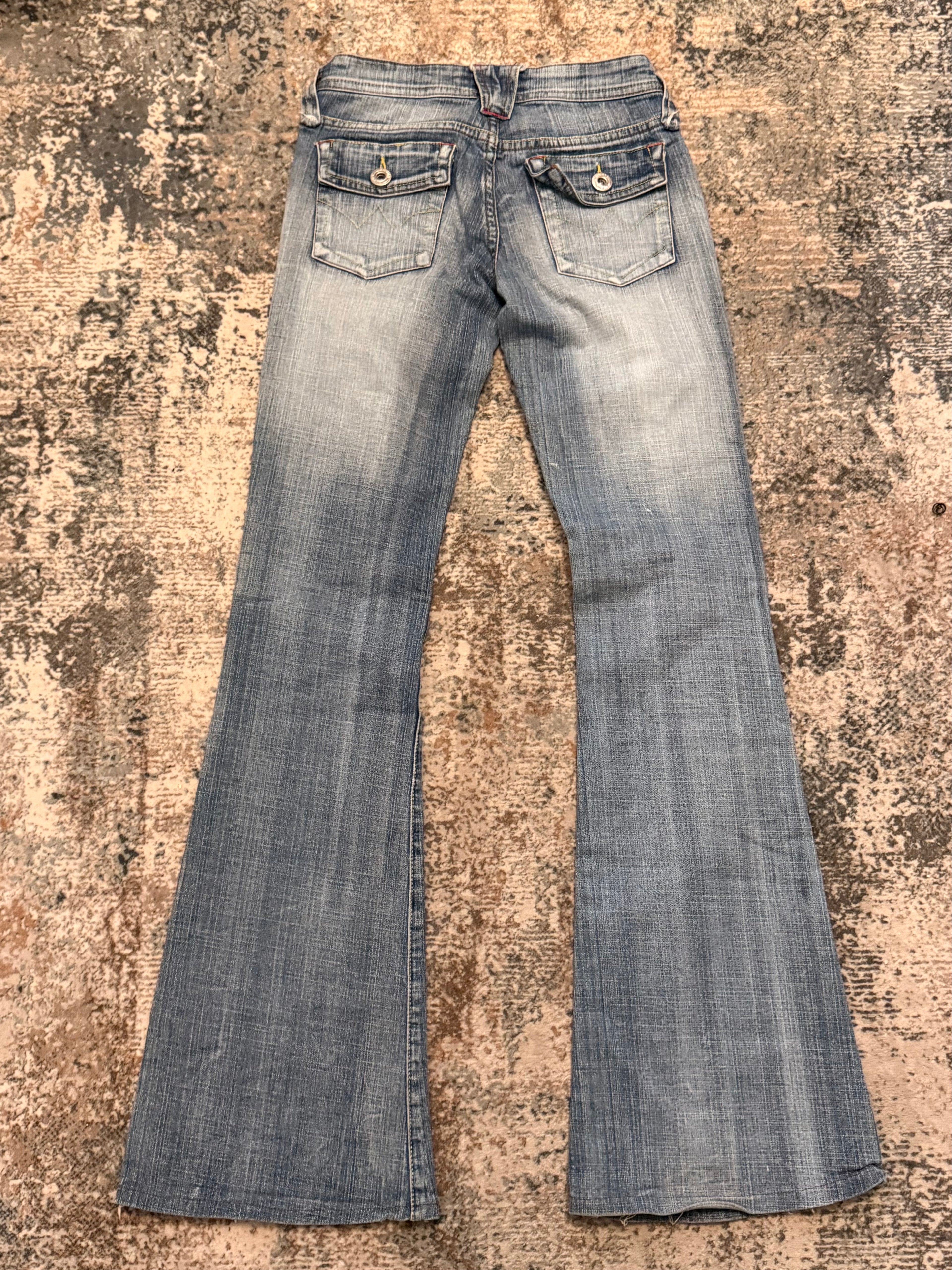 The Distressed Flare Denim
